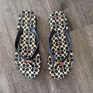 Coach Black and Cream Patterned Flip Flops with Red Detail